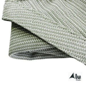 Detailfoto van het materiaal van een groen schaduwdoek